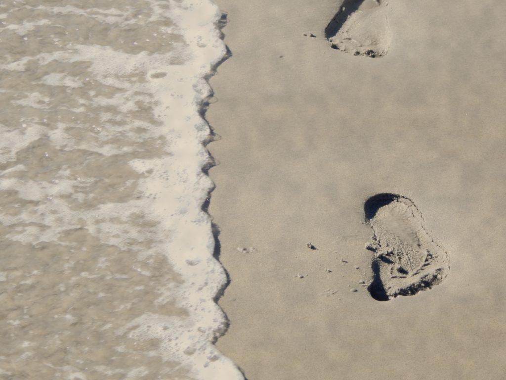 foot prints on beach